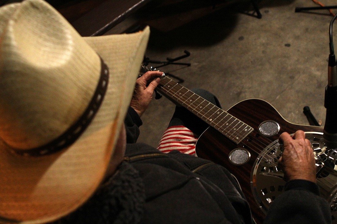 Bill Coblentz plays slide guitar on his custom-built resonator. Photos by Rachel S O'Hara.