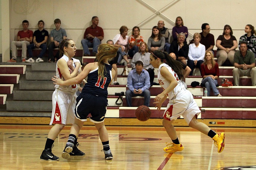 Cardinal Mooneyâ€™s Abby Donofrio, No. 32, does a pick to stop Indian Rocksâ€™ Rebecca Lizotte, No. 11, from taking the ball from Cardinal Mooneyâ€™s Camille Giardina, No. 22.