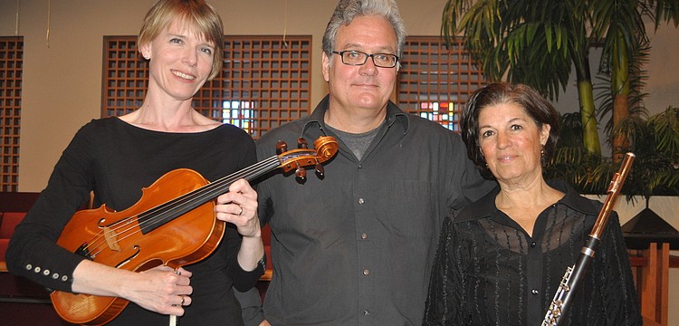 Trio Voila includes Laura Jensen-Jennings on the viola, Thomas Koch on the guitar and Dr. Jane Hoffman on the flute.