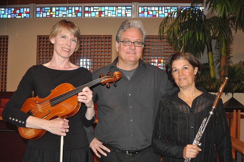 Trio Voila includes Laura Jensen-Jennings on the viola, Thomas Koch on the guitar and Dr. Jane Hoffman on the flute.