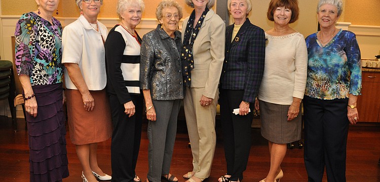 Peggy Sue Mitchell, Pam Trudel, Joyce Goacher, Anita Moltz, Mary Jane Hamilton, Beatty Shipley, Margorie Martini and Marge Vaadi modeled clothing from Dillard's.