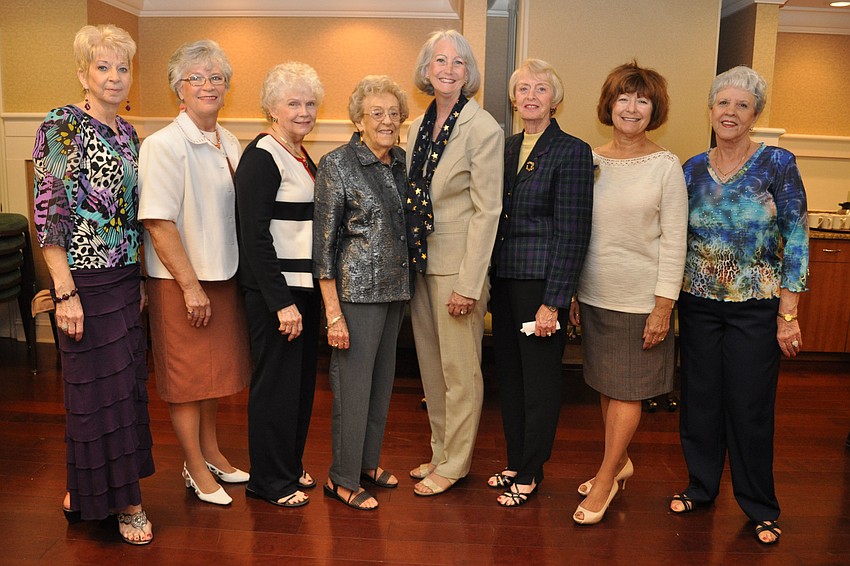 Peggy Sue Mitchell, Pam Trudel, Joyce Goacher, Anita Moltz, Mary Jane Hamilton, Beatty Shipley, Margorie Martini and Marge Vaadi modeled clothing from Dillard's.