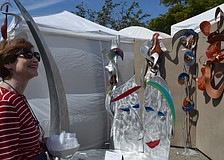 Barbara Steinfirst came from Bradenton to enjoy the various works at the festival.