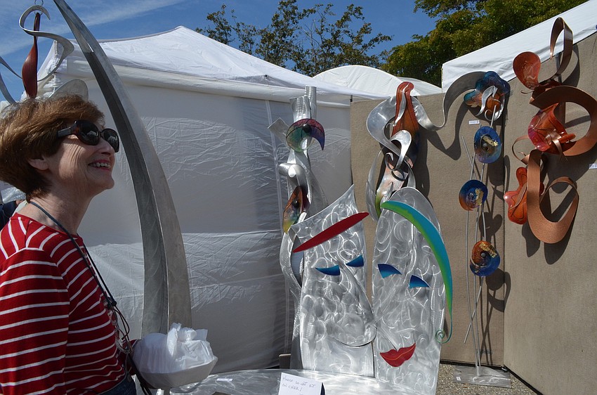 Barbara Steinfirst came from Bradenton to enjoy the various works at the festival.