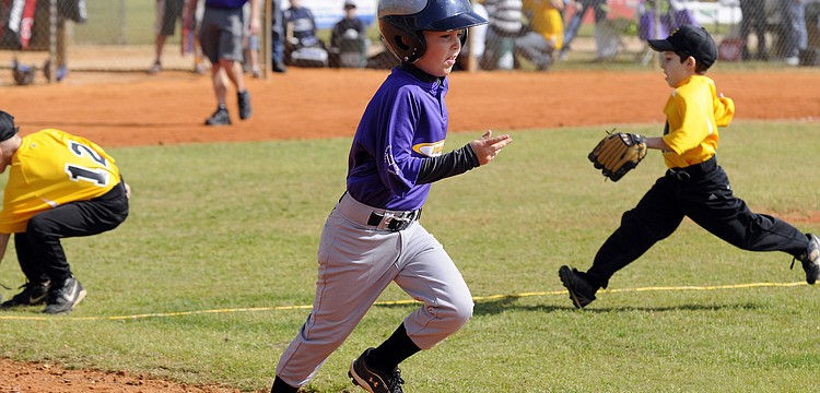 Seven-year-old Chase Prestonâ€™s favorite part of baseball is hitting.