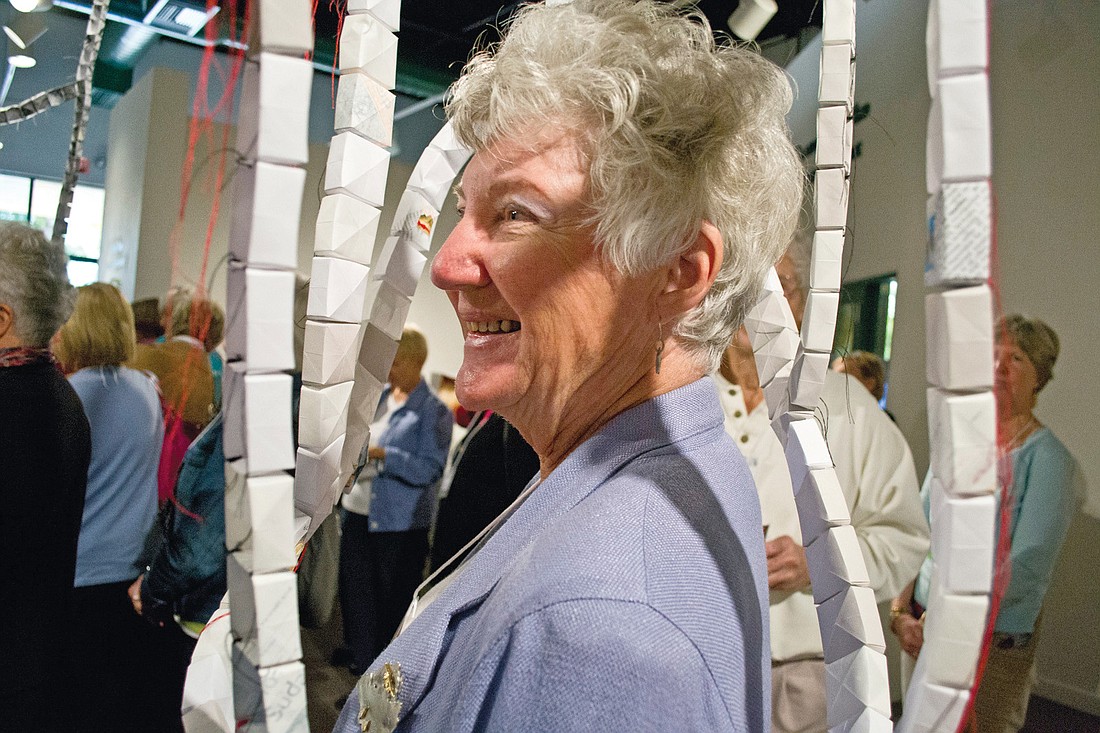 Donna Vasko was delighted with the curtains exhibit. Courtesy.