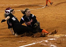 Riverviewâ€™s Courtney Kelly, No. 2, tries to slide into third base but Sarasotaâ€™s Shelby Thorpe, No. 13, beats her to the base and tags her out.