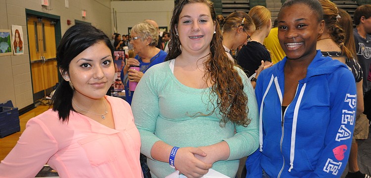 Erica Cantu, Emily Williams and Briana Twenty visited the U.S. Army and University of South Florida tables.