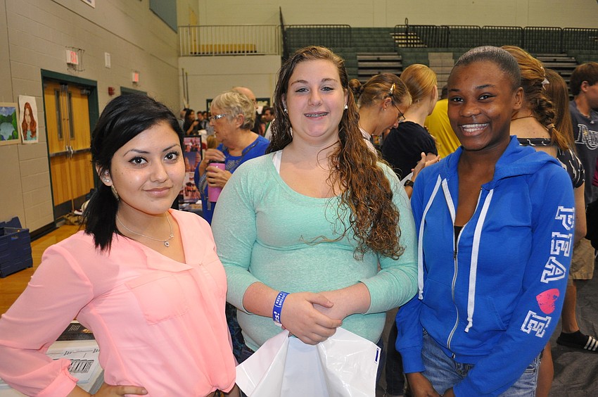 Erica Cantu, Emily Williams and Briana Twenty visited the U.S. Army and University of South Florida tables.