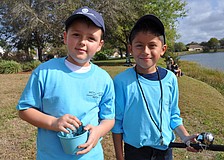 Andrew Dulka, 9, fished with his cousin, Sebastian Barrera, 8.