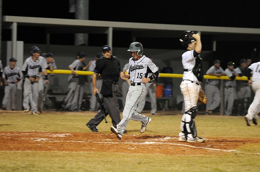 Lakewood Ranchâ€™s Joey Ambrosino scores one of Lakewood Ranchâ€™s eight runs.