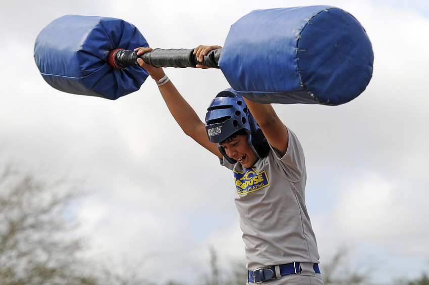 Daniel Torrealba, 9, celebrates after winning his gladiator competition.