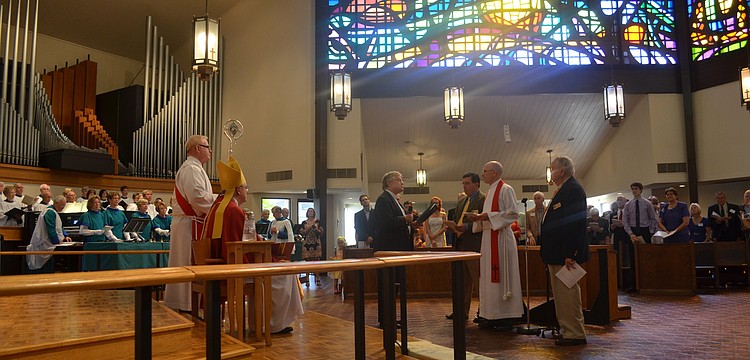 The Rt. Rev. Dabney Smith of the Diocese of Southwest Florida was present at the installation of Rev. John C. N. Hall Saturday, Feb. 23 to present him as the new rector.