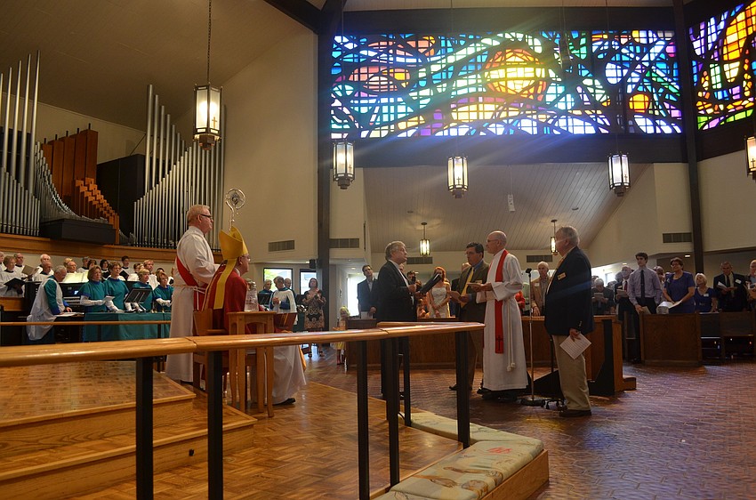 The Rt. Rev. Dabney Smith of the Diocese of Southwest Florida was present at the installation of Rev. John C. N. Hall Saturday, Feb. 23 to present him as the new rector.