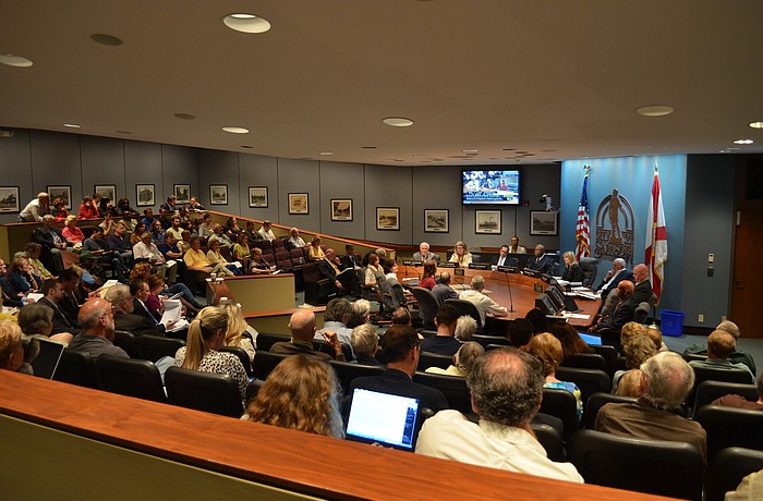 Residents both in support of Walmart and opposed to the supercenter spoke before the City Commission.