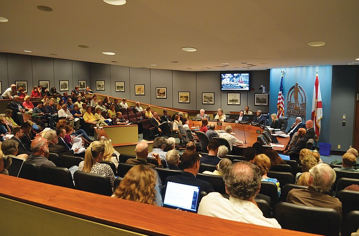 City commissioners listened to more than 50 residents for more than three-and-a-half hours. Photos by Roger Drouin.