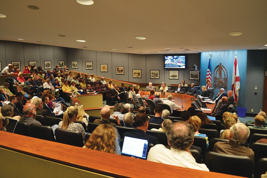 City commissioners listened to more than 50 residents for more than three-and-a-half hours. Photos by Roger Drouin.