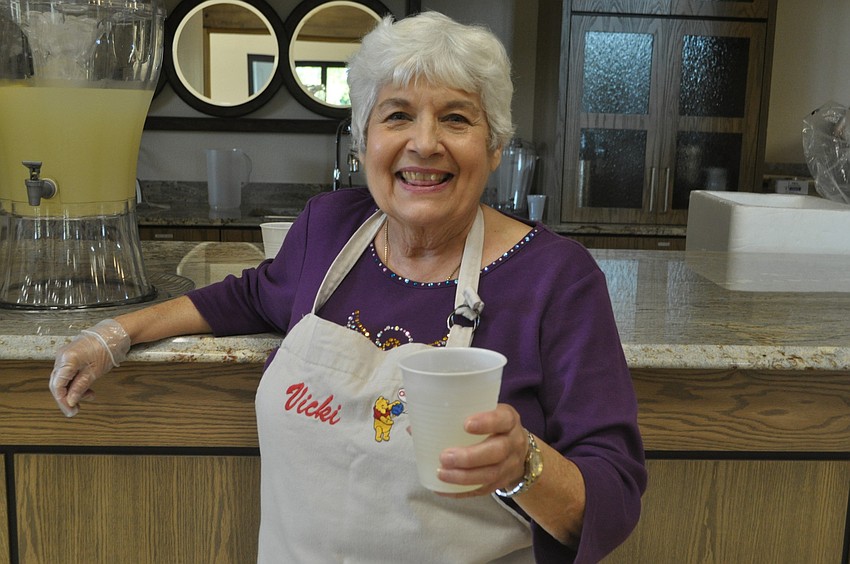Vicki Workman serves lemonade