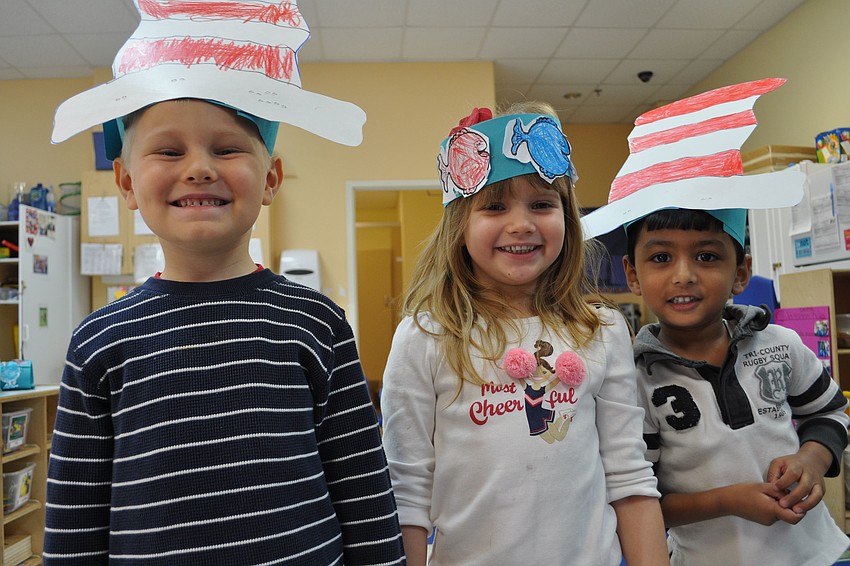 Michael Cole, Addison Weimann and Vedant Singh like wearing the hats they created.