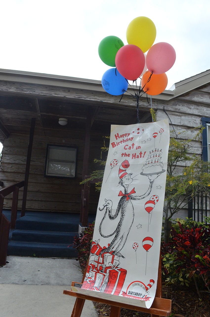 A sign leads into the Dr. Seuss book reading.