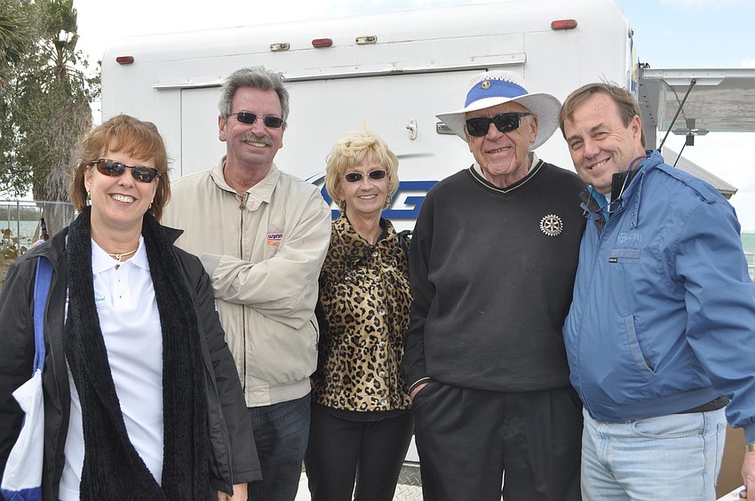 Sarasota Rotarians Sandy Moser, Bob and Bonnie Kerwin and Jim Henry with Tom Waters, chief advancement officer of Mote Marine