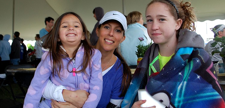 Jaime Barcelo with her daughter, Logan, and Skylar Hernandez