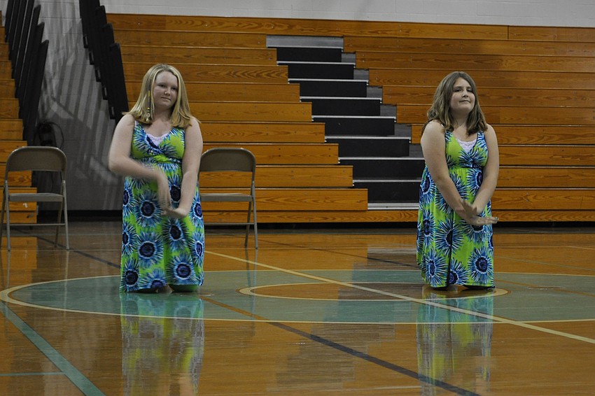 Sixth-graders Ashley Cole and Karagan Murfin used chairs as props in their routine.