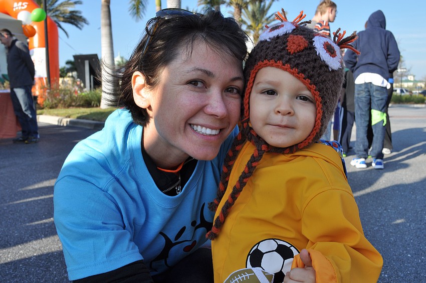 Emilie Pinho walked with her son, Matthew.