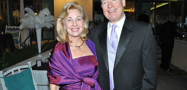 Toi and Sandy Estes credited their matching purple hues to â€œunintentional coordination.â€