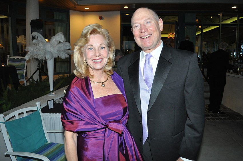 Toi and Sandy Estes credited their matching purple hues to â€œunintentional coordination.â€