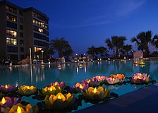 Residents paid attention to detail and decorated the pool with floating lily pad candles.
