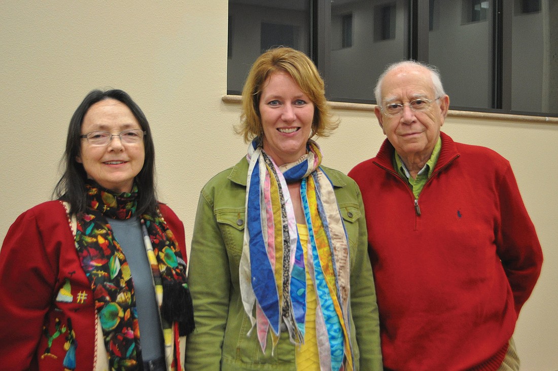 Speaker Joy Baker, center, with Corinne and Samir Ragheb
