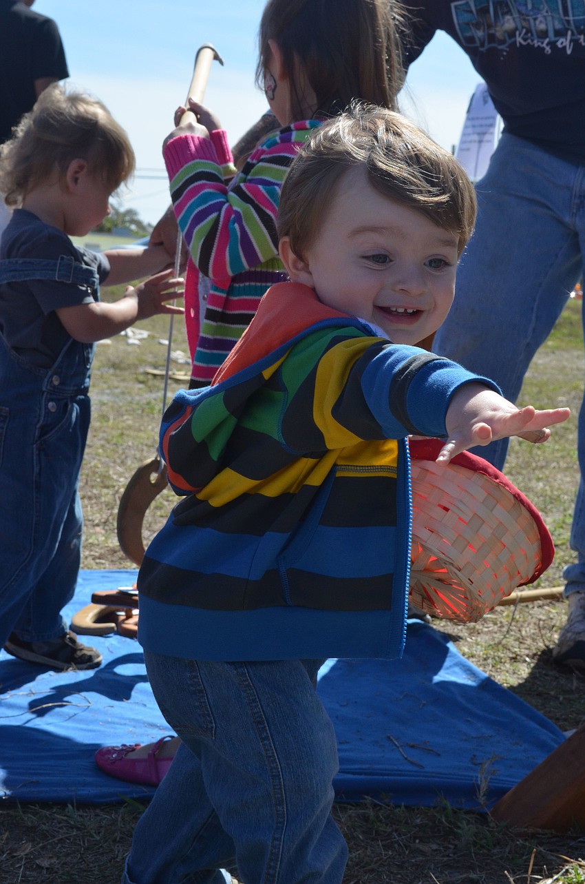 Aiden Berry, 16 months, loved tossing balls in Pinocchioâ€™s Land.