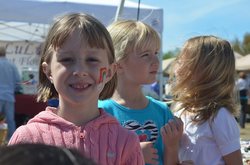 Tafman Henry, 5, got a rainbow painted on her face.