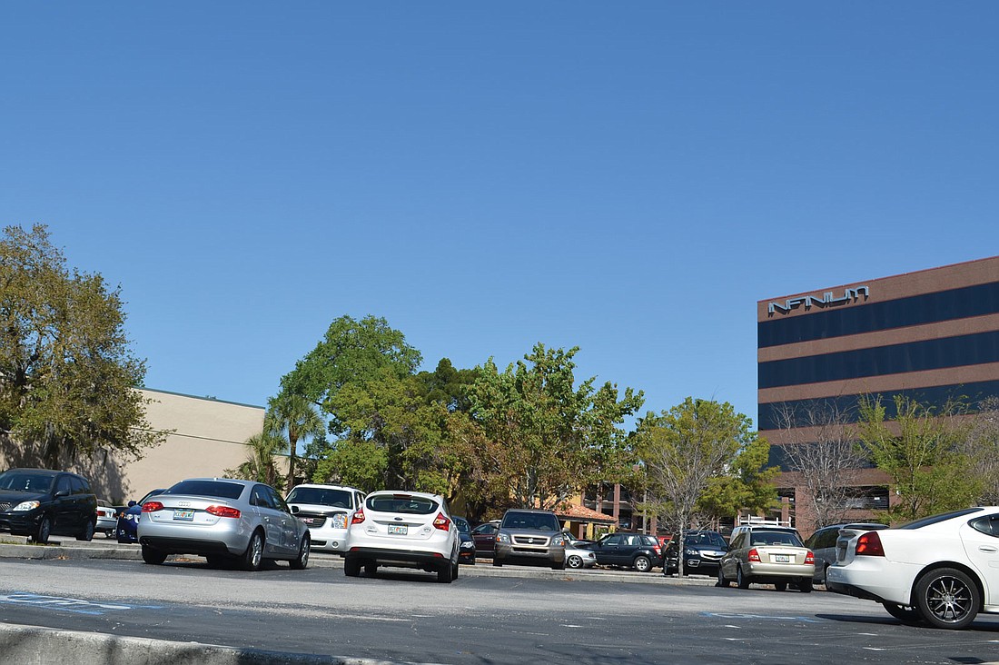 The acre of land currently houses parking for the Sarasota County Courthouse and clerkÃ¢â‚¬â„¢s office.
