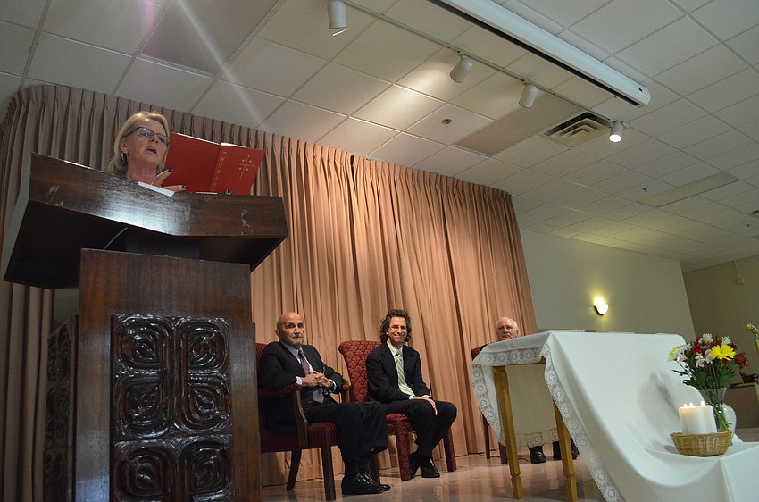 Sheryl Wieggers sings to all faith members.