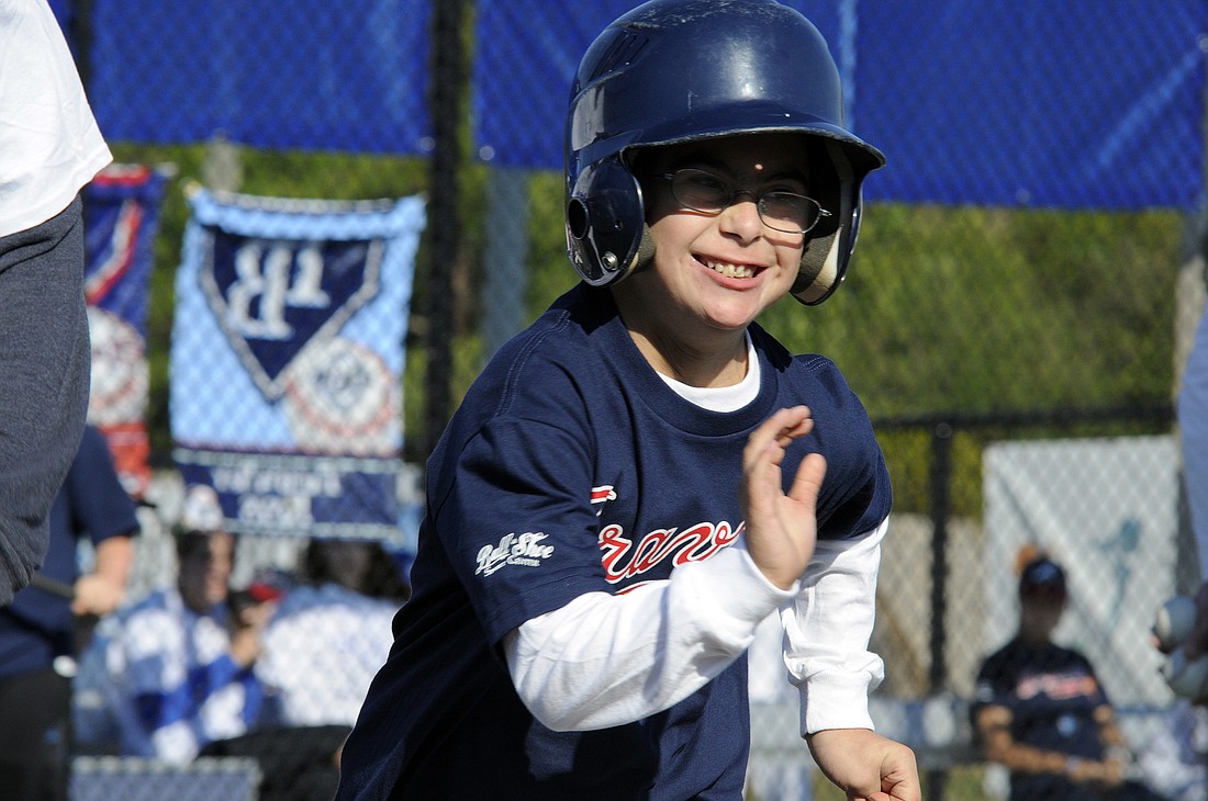 Payton Aaron couldn't contain his enthusiasm as he raced down the first base line.