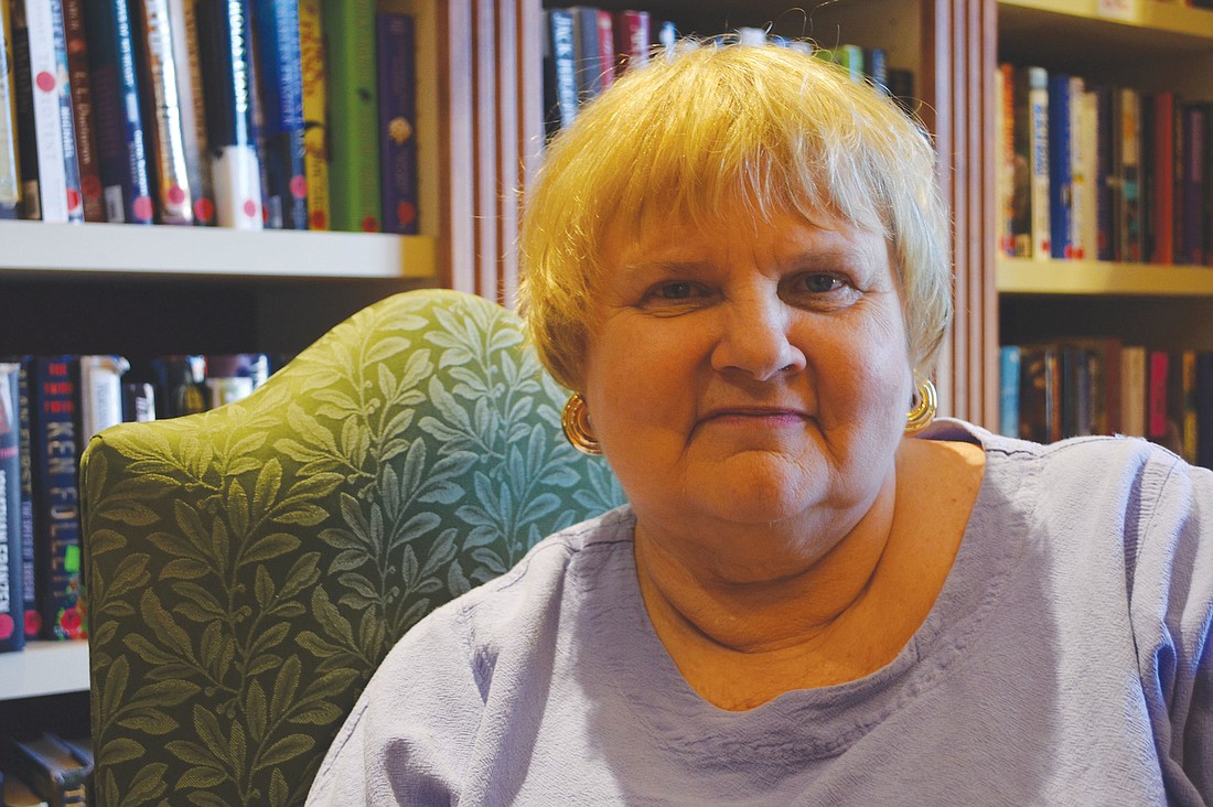 Kathleen Ellis regularly volunteers in the library at