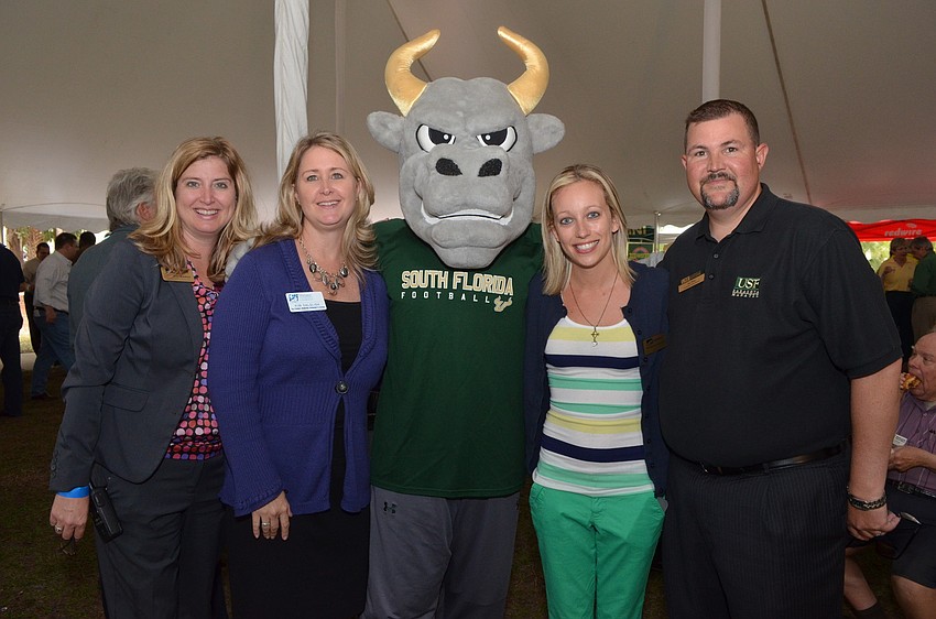 Heather Kasten, Kim Dalgish and University of South Florida Sarasota-Manatee mascot Rocky with Brittany Lamont and Jay Riley