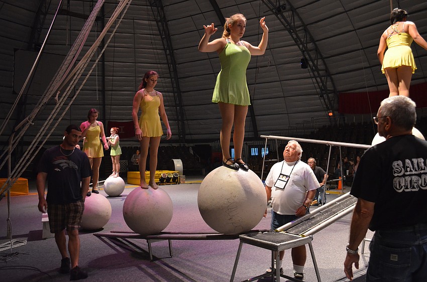Sailor Circus girls walking on globes