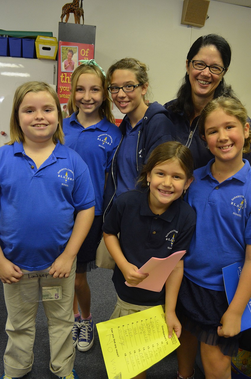 The Rev. Kathi Wiggins, of Siesta Key Chapel, visits her grandchildren and picked some up along the way. Lindsey Troyer, Emmy Morris, Emma Johnson, Chloe Johnson, Kathi Wiggins and Grace Johnson