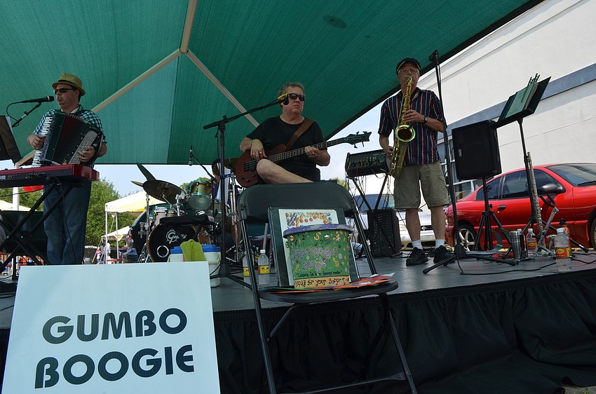 The Gumbo Boogie Band performs Cajun music for the crowd.