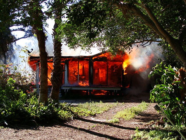 Flames engulfed the home in the 700 block of LandÃ¢â‚¬â„¢s End Drive the morning of March 21. Photos courtesy of Longboat Key Fire Rescue