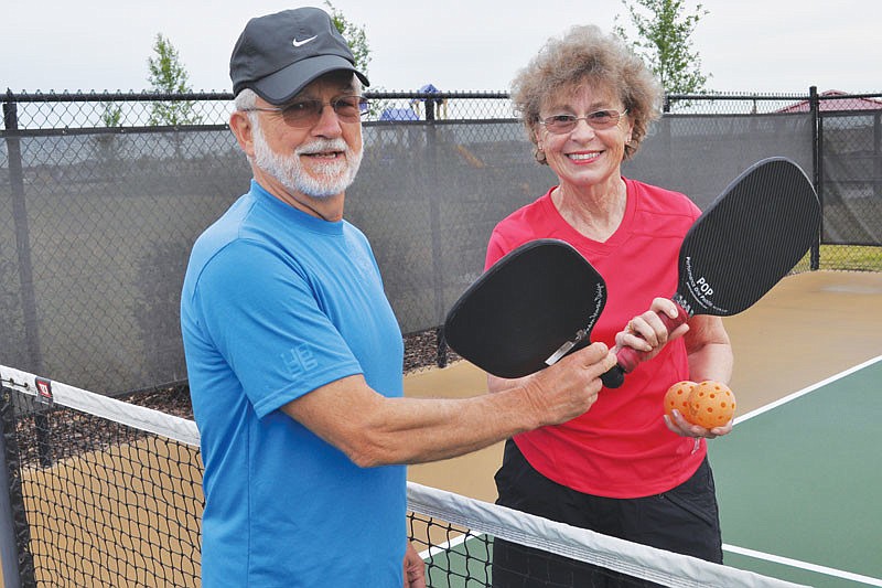 Dwight and Jacqueline Bissonette love living in Esplanade, where they regularly play pickelball, a miniature-tennis-like game.