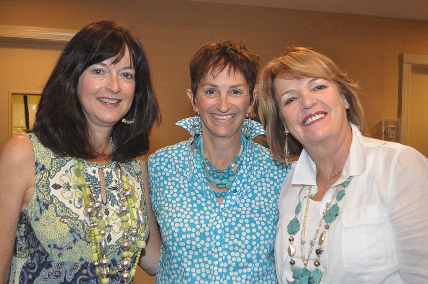 Rosemary Mahoney, Martha Schantz and Patti Lowe mingle before walking the catwalk.