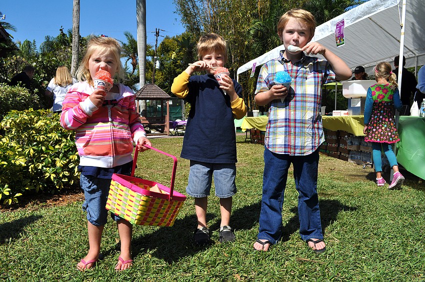 Willa Donovan, 3, Gabriel Redman, 5, and Henry Donovan, 5, enjoy their sno-cones.