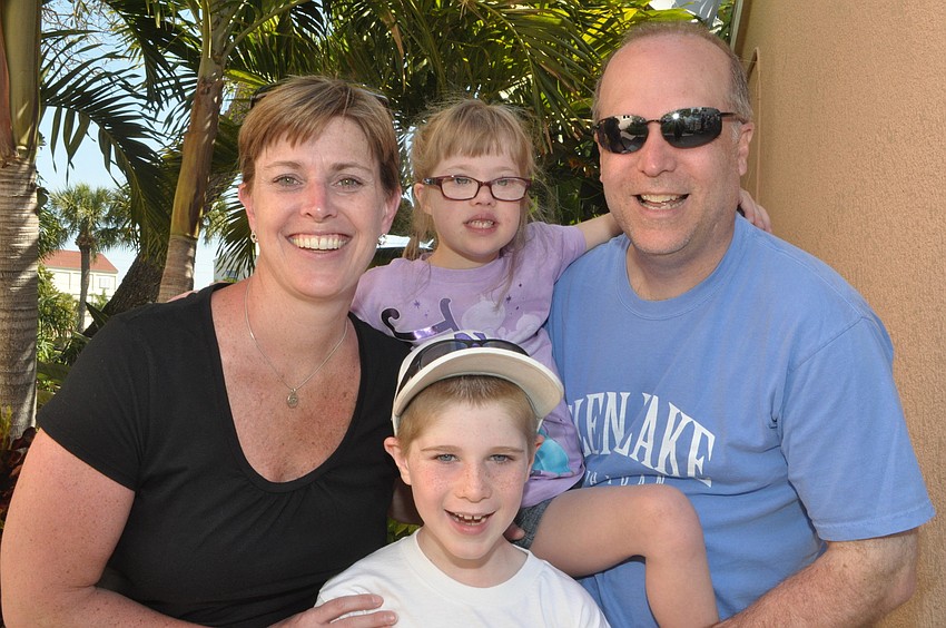 Sarah, Mike, Bobby, 7, and Maria Alzamora, 5