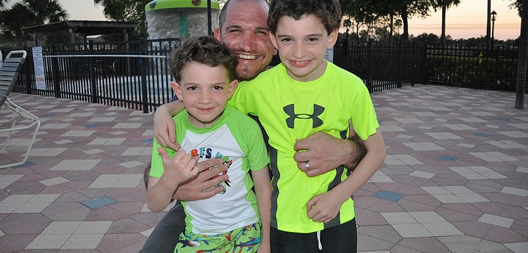 Bryan Allman and his sons, Parker and Preston spent the day at the beach before the pool.