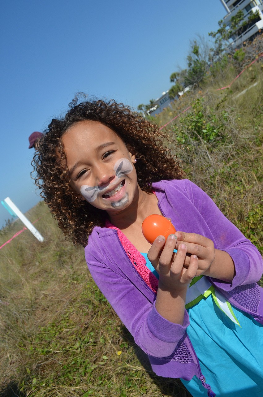 Cecilia Sanders was all smiles after she found her eggs at the Easter egg hunt.