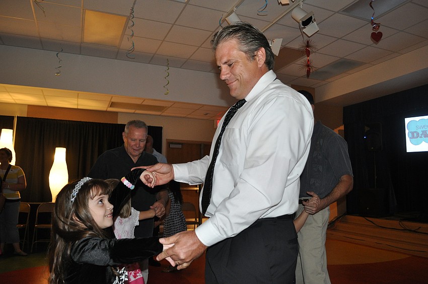 Abbigail Geiger and her dad, Jeremy, slow danced.